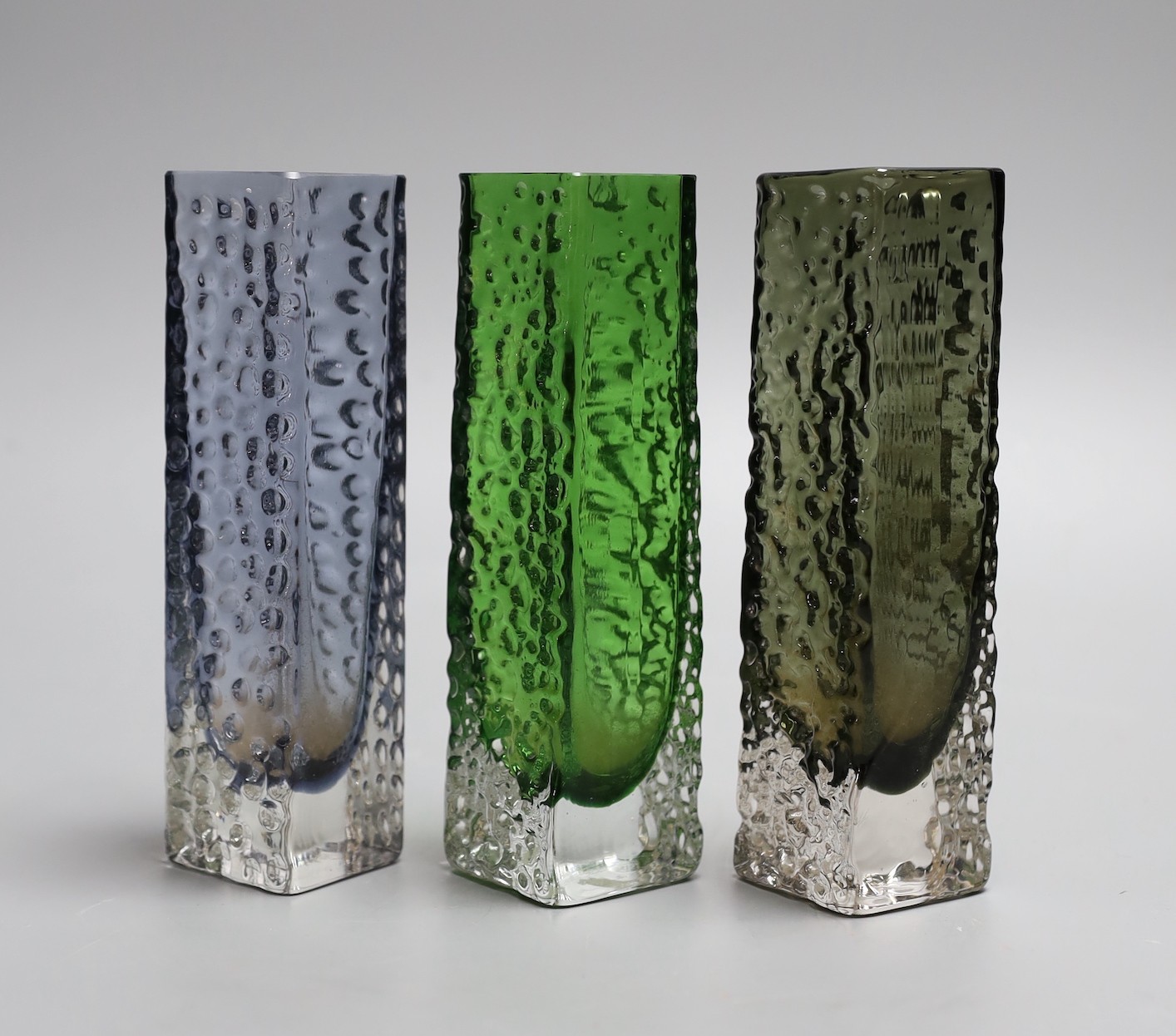 A trio of Whitefriars 'Nailhead' vases, model 9683, designed by Geoffrey Baxter, various colours, 17cm high.